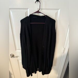 Black knitted soft jacket.